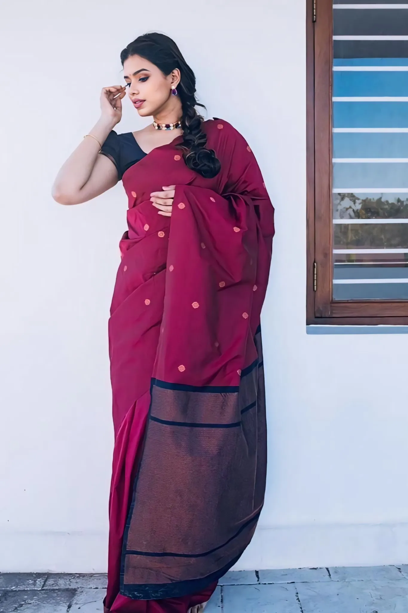 A FOREST SILK SAREE WITH SUBTLE ZARI BUTTAS AND RICH BORDER
