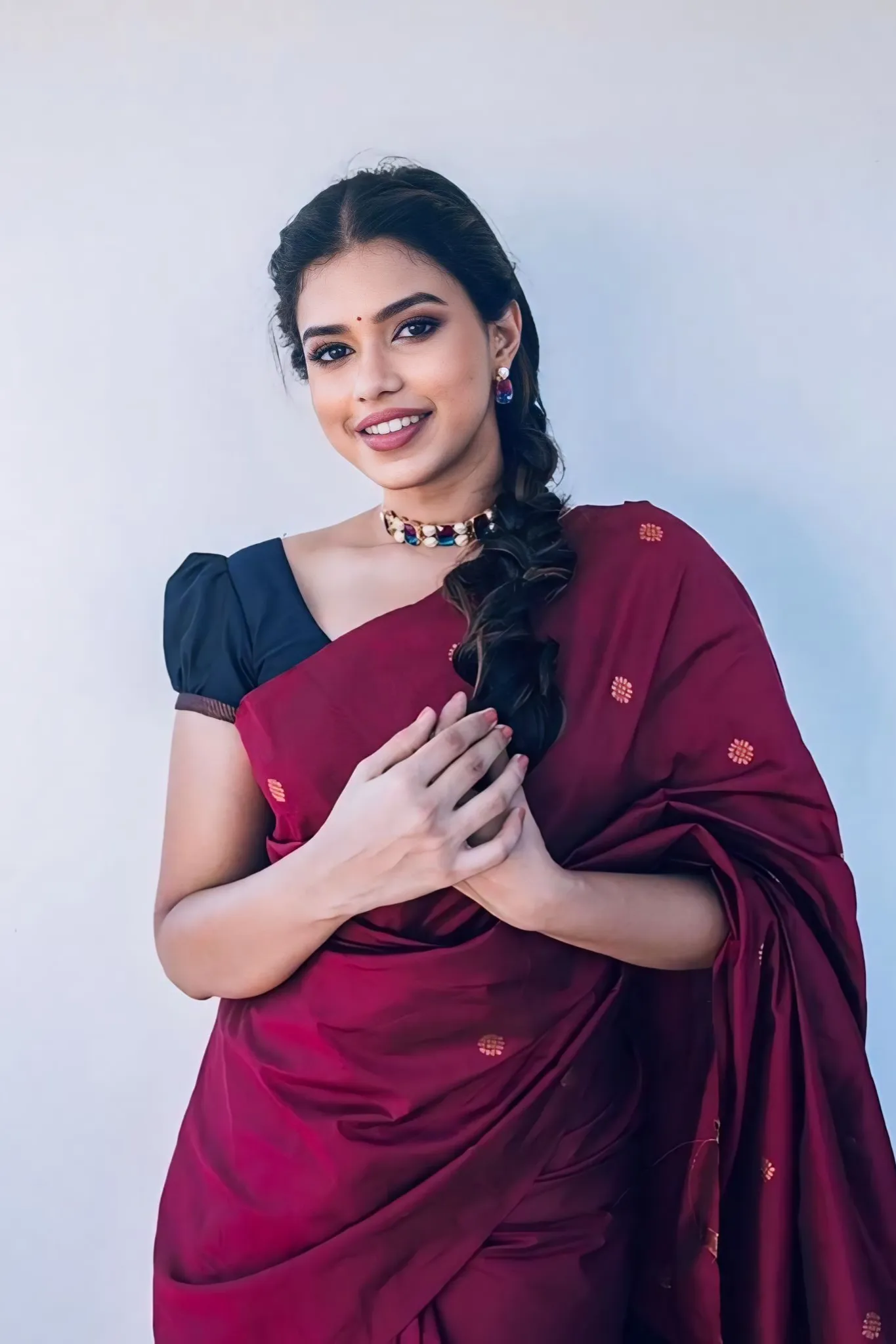 A FOREST SILK SAREE WITH SUBTLE ZARI BUTTAS AND RICH BORDER