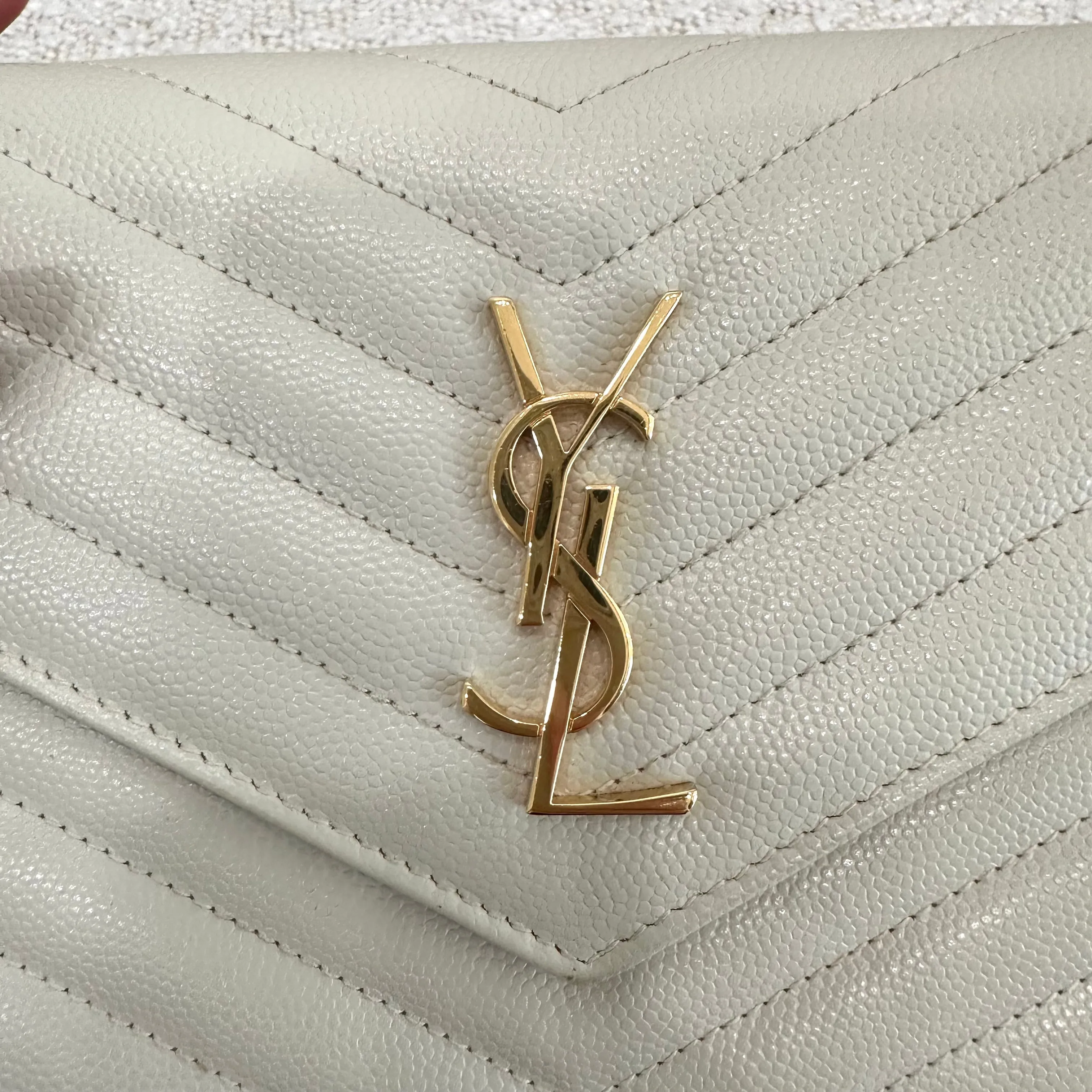 SAINT LAURENT CASSANDRE ENVELOPE CHAIN WALLET IN GRAIN DE POUDRE LEATHER