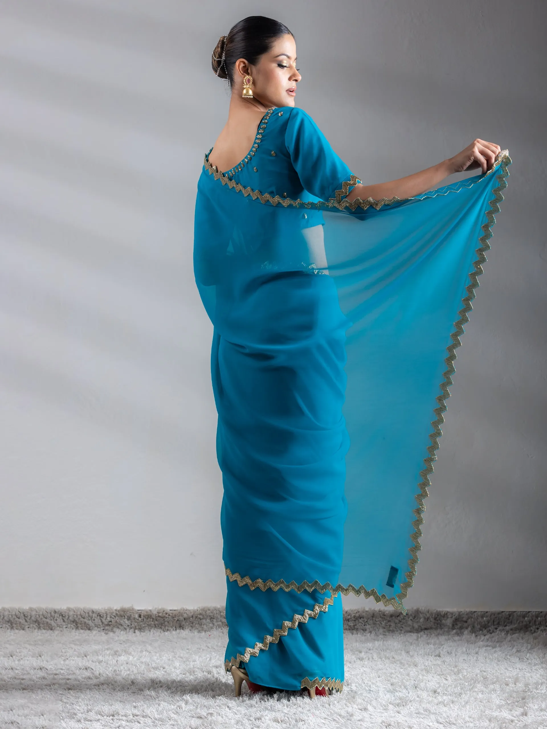 Turquoise Sequin Georgette Saree with Blouse Fabric