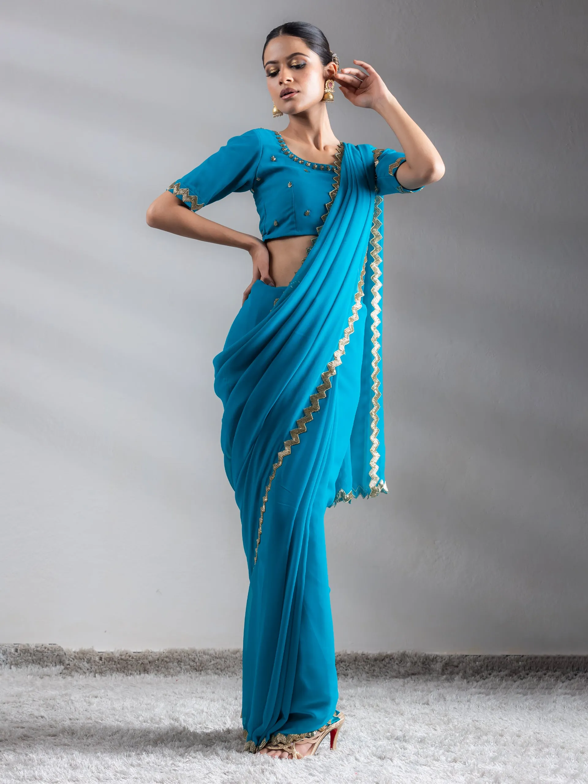 Turquoise Sequin Georgette Saree with Blouse Fabric
