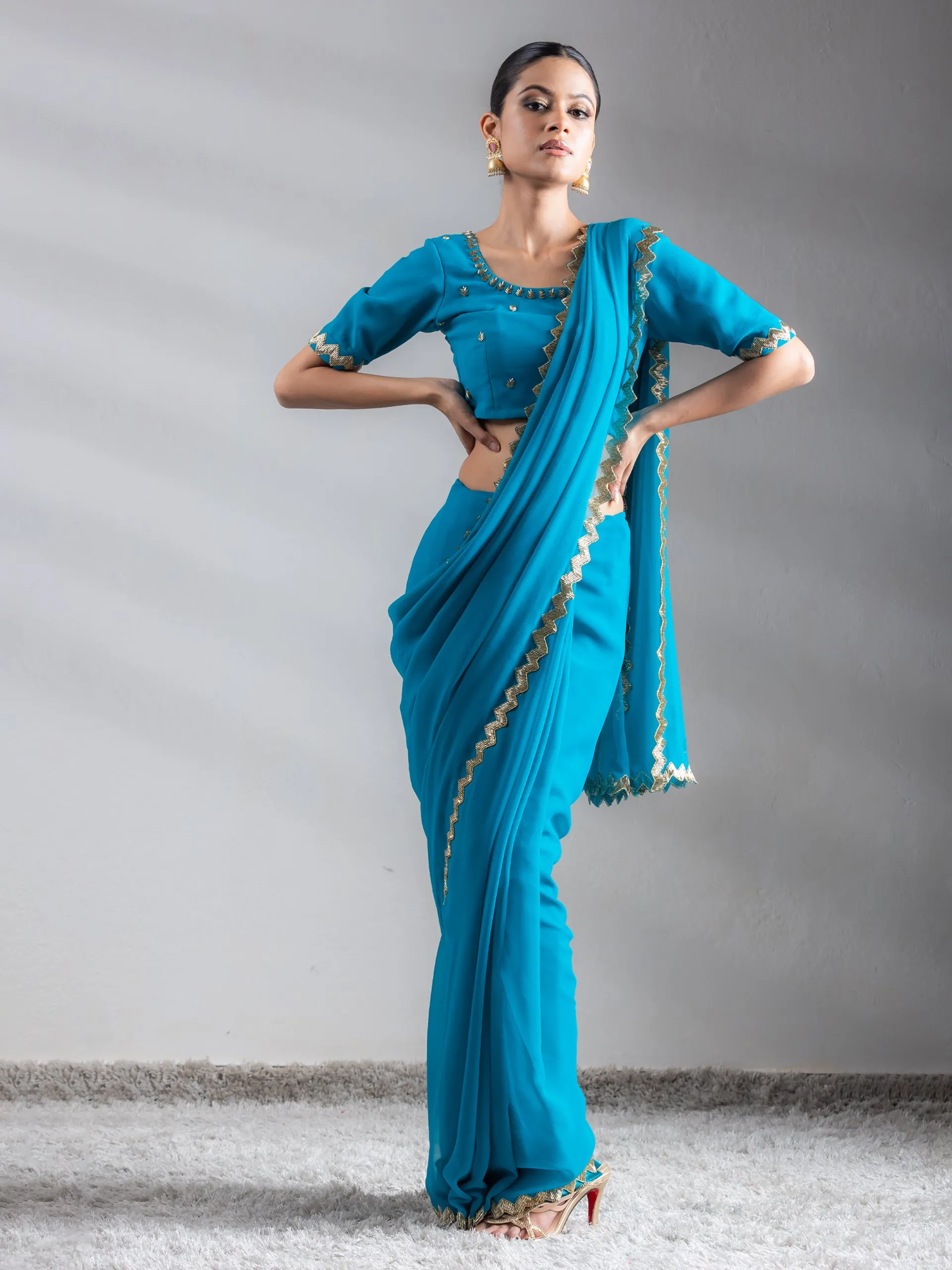 Turquoise Sequin Georgette Saree with Blouse Fabric
